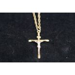 9ct Gold chain with yellow metal cross pendant Tot
