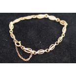 9ct Gold bracelet with safety chain
