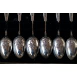 Set of 6 cased silver spoons, each bowl different
