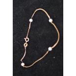 9ct Gold bracelet set with 4 pearls