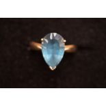 9ct Gold unmarked pear shaped, blue stone ring Siz