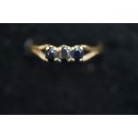 9ct Gold ring set with blue stones Size O