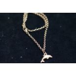 9ct Gold bracelet with dolphin charm