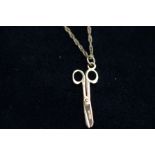 9ct Gold chain with 9ct Gold scissor pendant