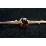 9ct Gold pin brooch set with large amber stone Wei