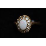 9ct Gold ring set with opal & white stones Size M