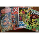 3 Early Marvel comics together with a X Men comic