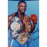 Evander Holyfield autograph, signed on a 10" x 8"