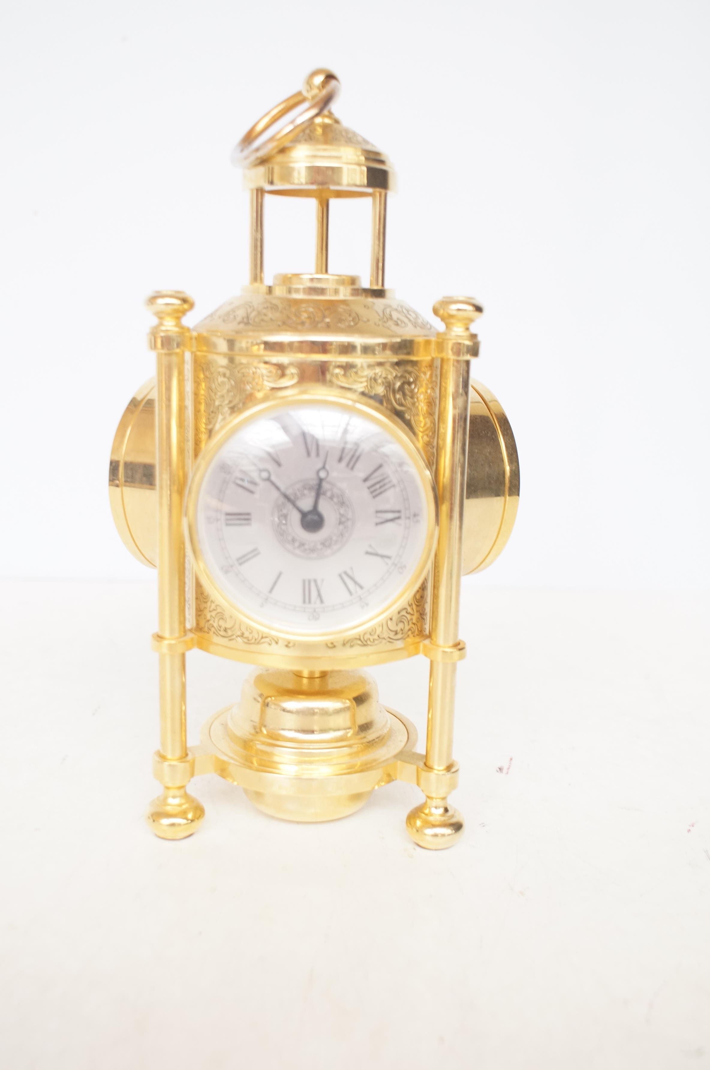 Brass clock, barometer, thermometer & compass