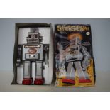 Tinplate boxed robot, smoking spaceman