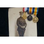 Set of WWI miniature medals with related postcard