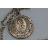 The queens jubilee 1977 silver chain & pendant