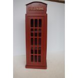 Wooden model of a London telephone box with 3 shel