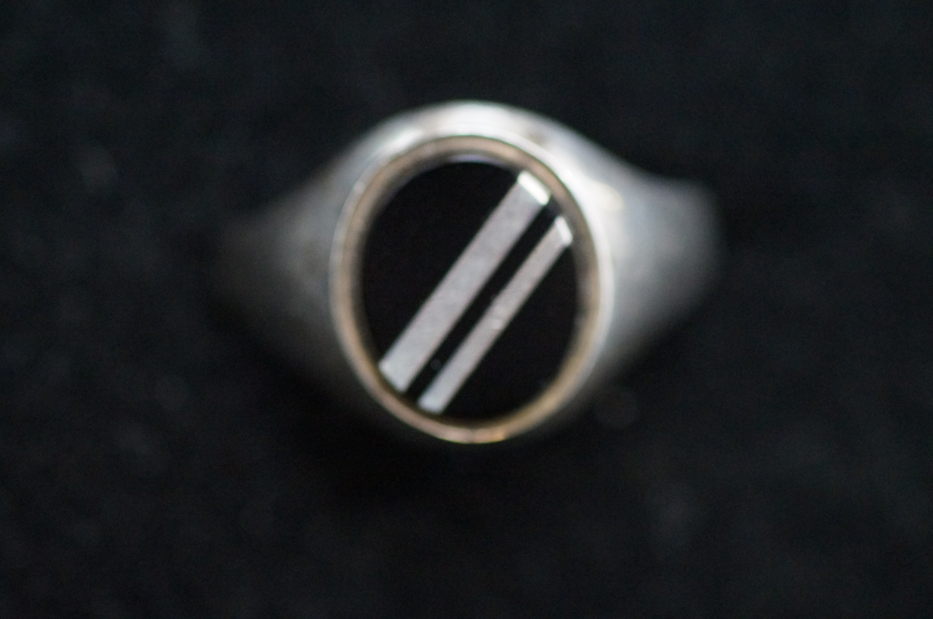 Silver ring set with black stone