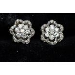 9ct White gold earrings set with 7 small diamonds