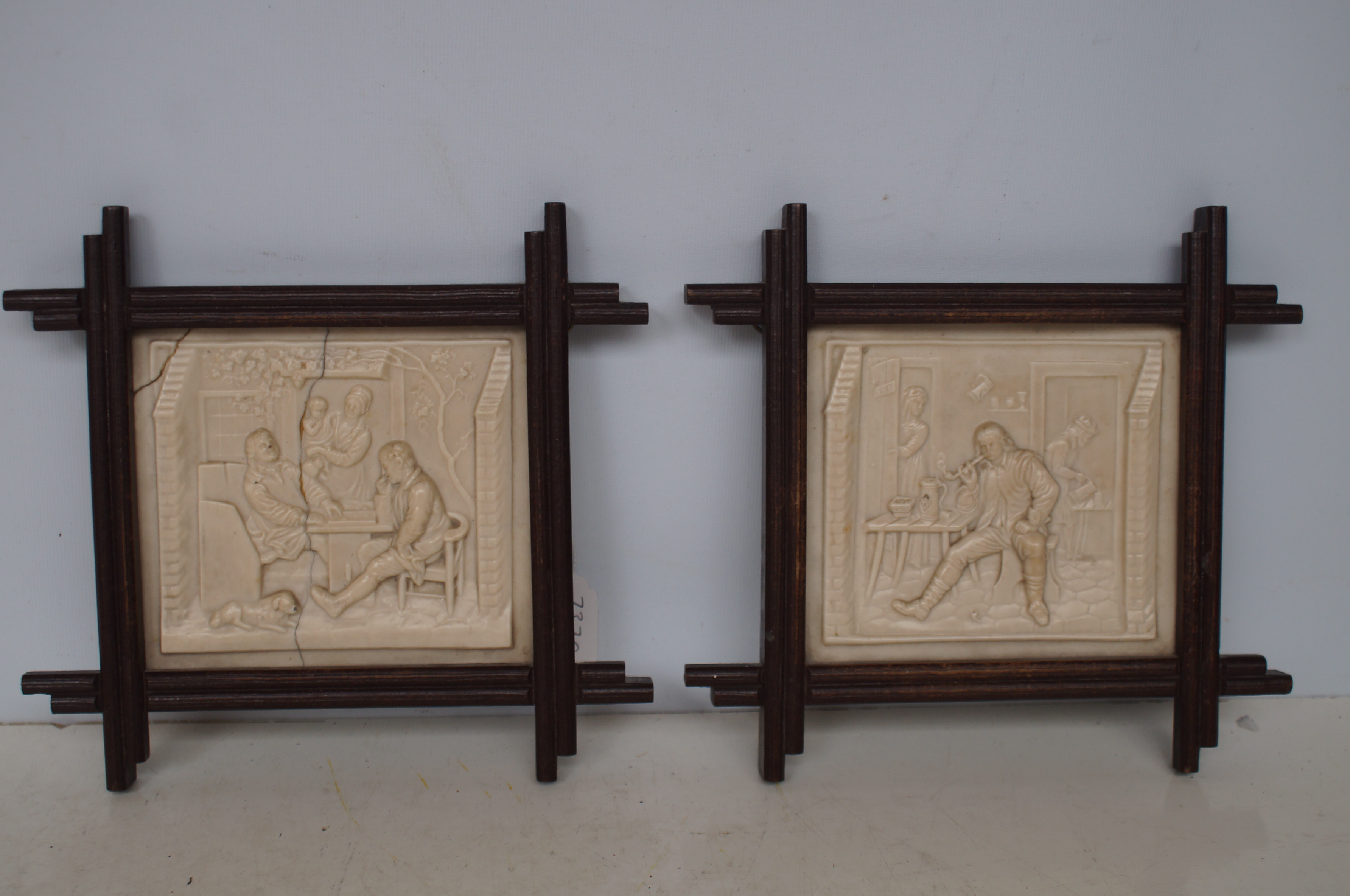 Pair of Victorian ceramic framed wall plaques, 1 A