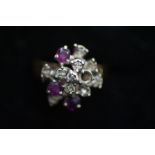 9ct Gold ring set with 10 diamonds & 3 amethyst (1