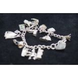 Silver charm bracelet 18 charms