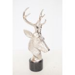 Stags head on marble base Height 32 cm