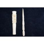 Early carved ivory cheroot holder together with a