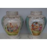 Pair of Continental vases both with hairline crack