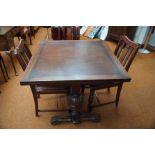 Early 20th century oak extending table with 3 chai