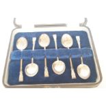 Cased set of sterling silver bean spoons