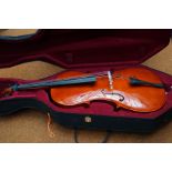 A cased cello & bow