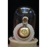 Silver fob watch, onyx stand with glass dome