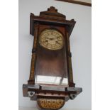 Wall clock with pendulum & key