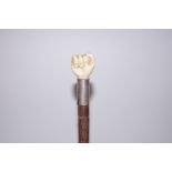 Sailors hand walking stick made from whales tooth
