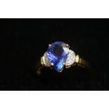 18ct Yellow gold ring set with large blue tanzanit