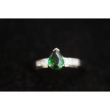 18ct White gold ring set with deep green gem stone