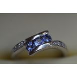 18ct White gold ring set with tanzanite & diamond,