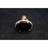 9ct Gold watch fob set with possibly jet stone Wei