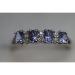 9ct White gold ring set with tanzanite & diamond