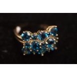 9ct Gold dress ring set with blue cluster gem ston