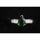 18ct White gold ring set with green stone & diamon