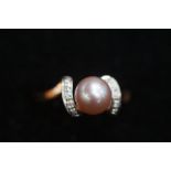 9ct Yellow gold ring set with central pearl & diam