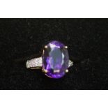 9ct Yellow gold ring set with large oval amethyst