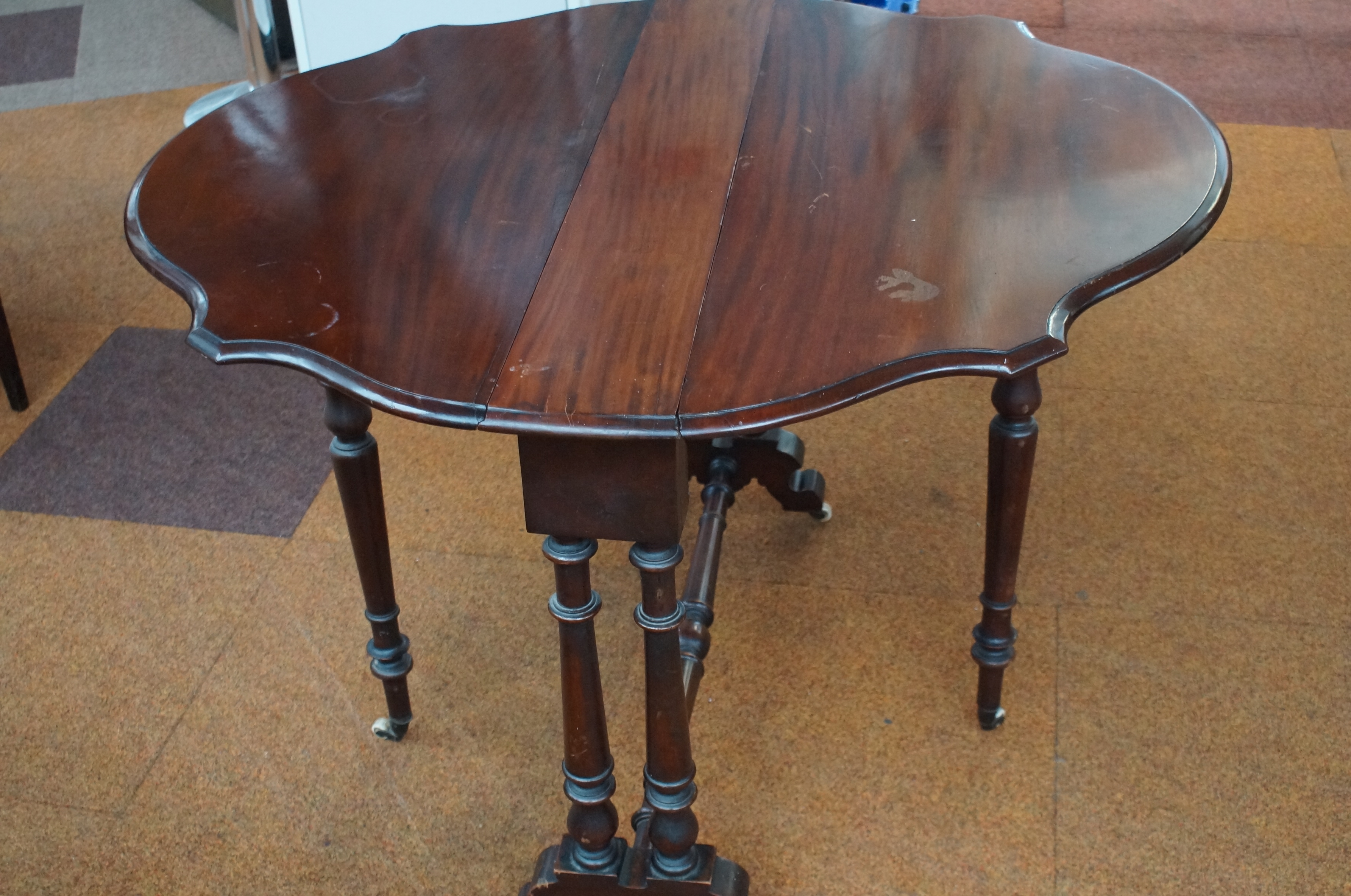Victorian mahogany Sutherland table on original ca