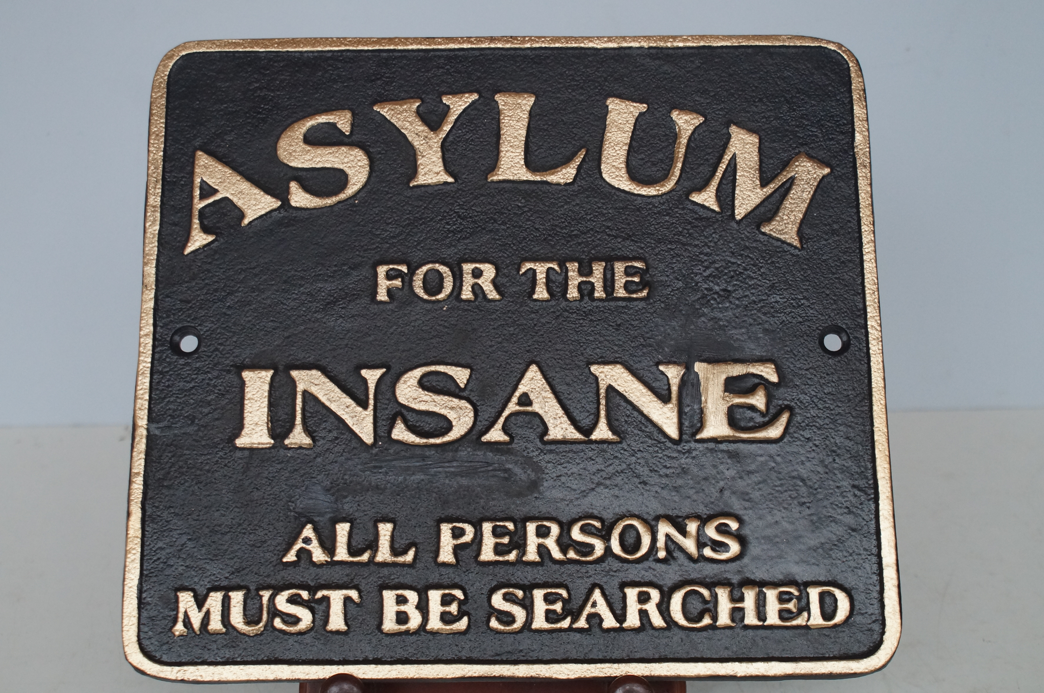 Cast iron Asylum sign