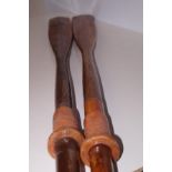 A pair of vintage wooden oars