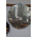 Frameless bevelled mirror