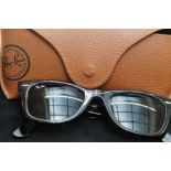 Pair of gents ray ban sunglasses with orignal box