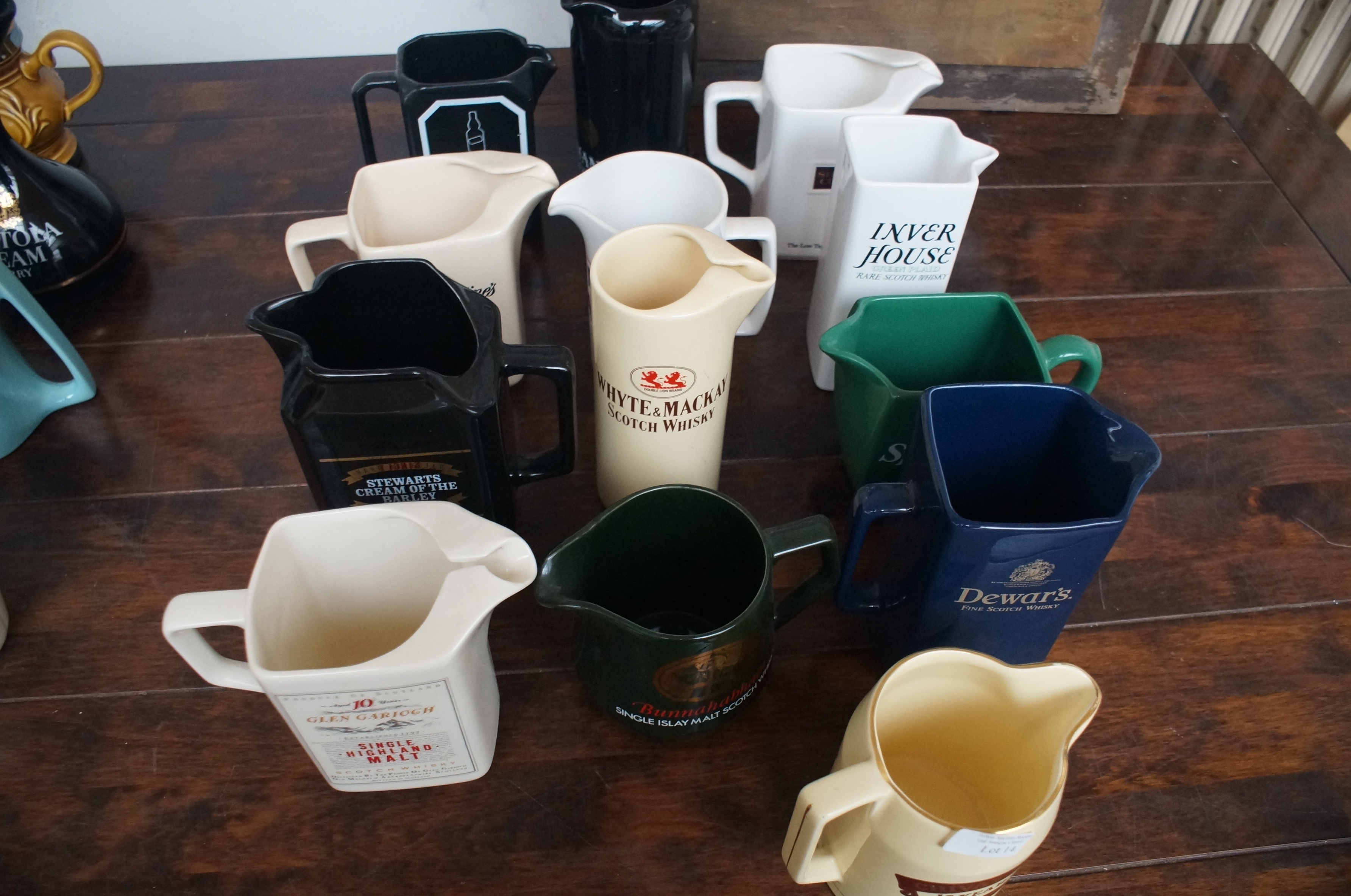 Collection of wade pub jugs, 13 in total