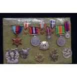 Mixed lot of WW2 medals & WW2 cap badges