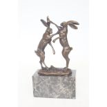 Bronze fighting hares on marble base Height 25 cm