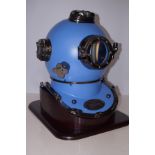 Blue divers helmet on base