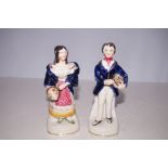 Pair of Victorian Staffordshire figures